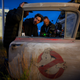 Director Jason Reitman hangs out with the Ecto-1 on the set of Ghostbusters: Afterlife